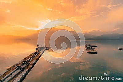 Beautiful sunrise and sky reflection over Sun Moon Lake Stock Photo