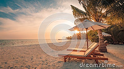 Beautiful sunset beach. Chairs on the sandy beach near the sea. Summer holiday and vacation concept. Inspirational tropical scene. Stock Photo