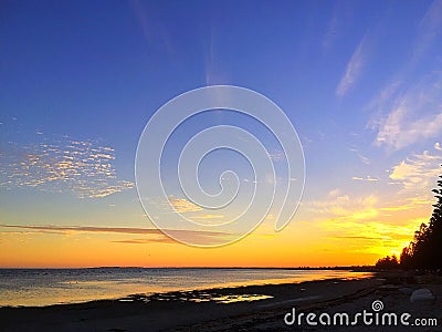 Beautiful sunset on the beach Stock Photo
