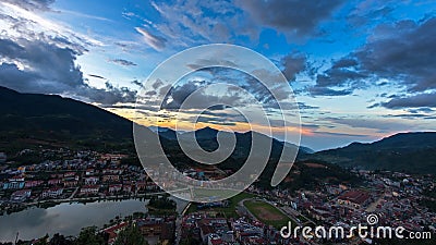 Beautiful sunset blue sky at Sapa valley city in the mist in the evening, Stock Photo