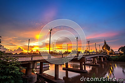 Beautiful of sunset at the Bridge over the Nan River in Phitsanulok City, Thailand. Stock Photo