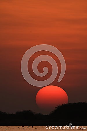 Beautiful sunset through the clouds in Kutchh, Gujarat, India Stock Photo