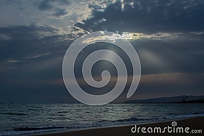 A Beautiful sunset with beautiful clouds & sunshine at hawksbay beach karachi pakistan Stock Photo