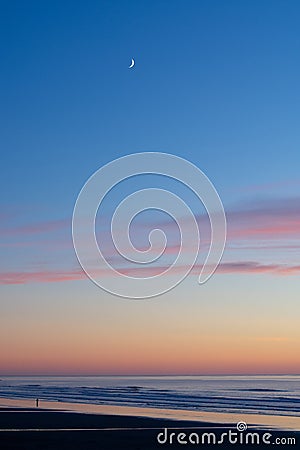 Sunset with Moon Stock Photo