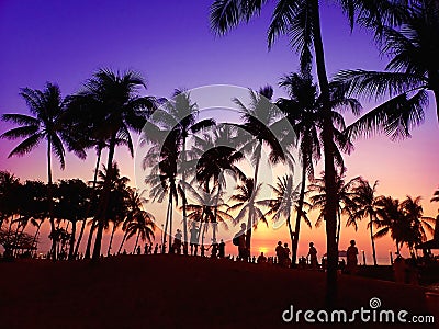 People standing taking beautiful sunset view. Stock Photo