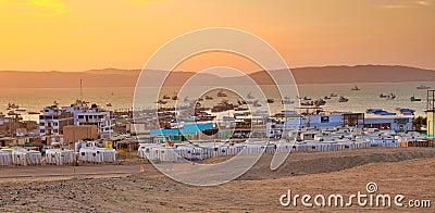 Beautiful sunset. Fisherman town built in a desert Stock Photo