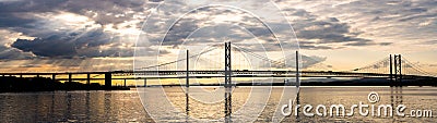 Beautiful sunset at The Forth road bridge and Queensferry crossing bridge Edinburgh Stock Photo