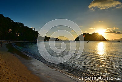 Beautiful sunset at Las Cabanas Beach in Philippines Stock Photo