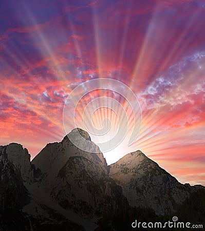 Beautiful sunset over a high mountains. Stock Photo