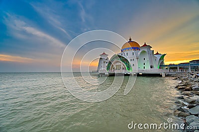 Beautiful sunset over the Malacca Straits Mosque or Masjid Selat Editorial Stock Photo