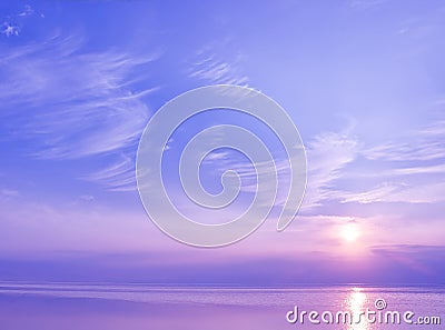 Beautiful sunset over the sea of blue and violet colors Stock Photo