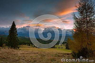 A beautiful sunset over the Tatra Mountains . The pass over Lapszanka in Poland Stock Photo