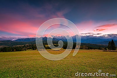 A beautiful sunset over the Tatra Mountains . The pass over Lapszanka in Poland Stock Photo