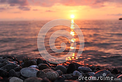 Beautiful sunset over the warm summer sea, gentle evening seascape Stock Photo