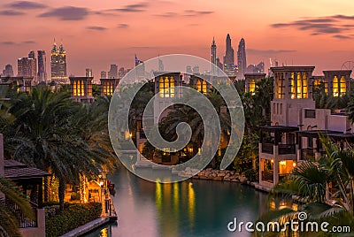 Beautiful sunset overlooking the canal, villas and skyscrapers of Dubai Editorial Stock Photo