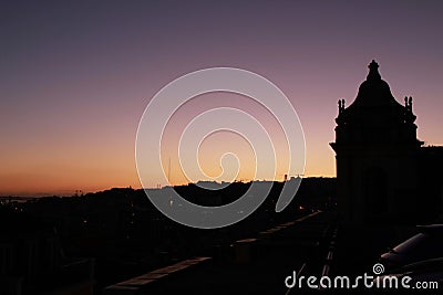 Beautiful sunset on a roof in Lisbon Stock Photo