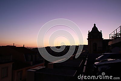 Beautiful sunset on a roof in Lisbon Stock Photo