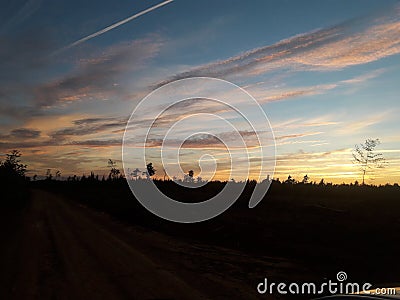 Beautiful sunset setting fire to the skies Stock Photo