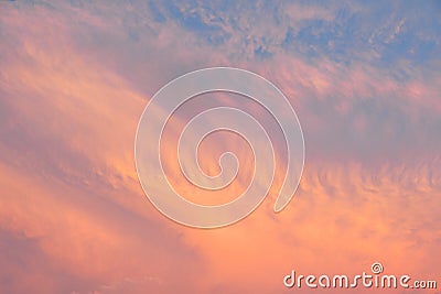 Beautiful sunset sky above clouds with dramatic light. Cabin view from airplane Stock Photo