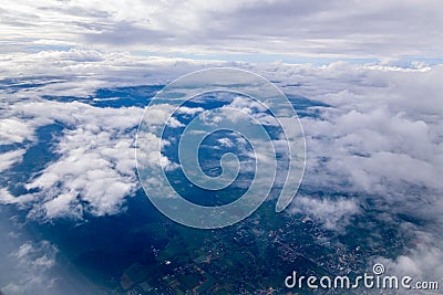 Beautiful sunset sky clouds seeing through the airplane windows Stock Photo