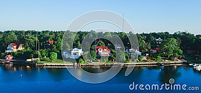 Beautiful super wide-angle aerial view of Stockholm archipelago skerries and suburbs with classic sweden scandinavian designed cot Stock Photo