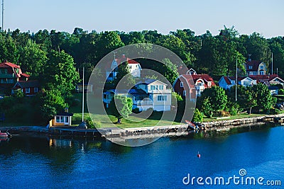 Beautiful super wide-angle aerial view of Stockholm archipelago skerries and suburbs with classic sweden scandinavian designed cot Stock Photo