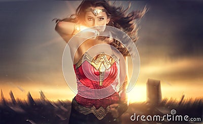 A beautiful superhero woman running in the sunset Editorial Stock Photo