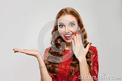 Beautiful surprised shocked woman model with red lips makeup and manicured nails on white background Stock Photo