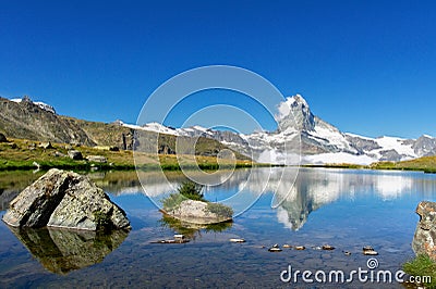 Beautiful Swiss Alps landscape with Stellisee lake and Matterhorn mountain reflection in water, Zermatt, Switzerland Stock Photo