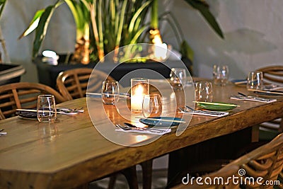 Beautiful table set in an elegant restaurant of Chora in Mykonos Stock Photo