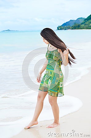 https://thumbs.dreamstime.com/x/beautiful-teen-girl-dipping-toes-water-tropical-beach-biracial-asian-caucasian-hawaiian-62164821.jpg