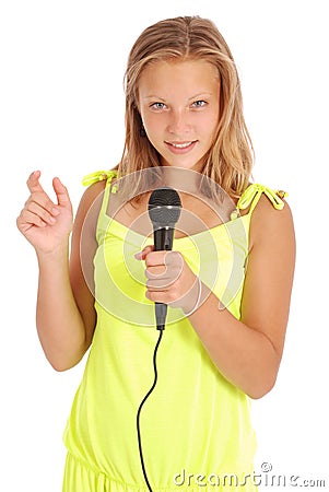 Beautiful teenage girl with microphone Stock Photo