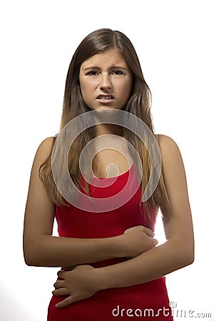 Beautiful teenage girl portrait with stomach ache Stock Photo