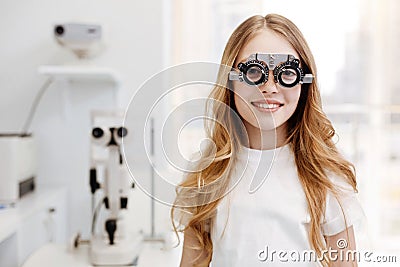 Beautiful teenage girl wearing trial glasses Stock Photo