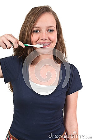 Beautiful Teenage Woman Brushing Teeth Stock Photo