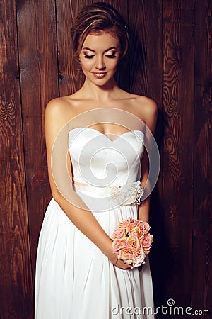 Beautiful tender bride in elegant lace wedding dress Stock Photo