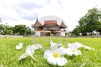 Beautiful Thai style house in a beautiful garden and lawn with azalea flowers Editorial Stock Photo