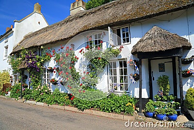 Beautiful thatched cottage with garden Stock Photo