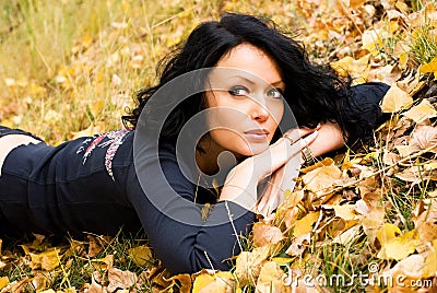 Beautiful thoughtful girl in the park Stock Photo