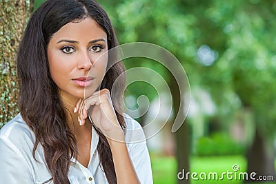 Beautiful Thoughtful Hispanic Woman Stock Photo