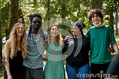 Beautiful tolerant mixed race people gathered together to show that friendship has no race Stock Photo
