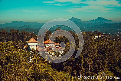 Beautiful top view. Town Kandy. Sri Lanka tourism. Ceylon travel. Ecotourism concept. Hotel building, guest house in jungle. Stock Photo
