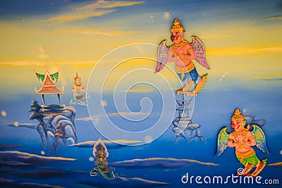 Beautiful traditional Thai style angels painting of folk literature on the ceiling at public Buddhist temple in Thailand. Stock Photo