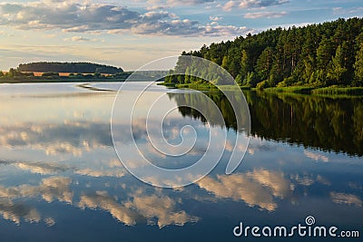 Beautiful tranquil lake with cloud reflection. Stock Photo