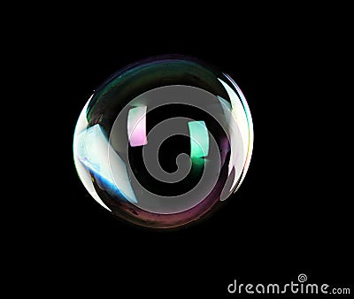 Beautiful translucent soap bubble on dark background Stock Photo