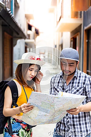 Beautiful traveler or backpacker young woman is confusing the wa Stock Photo