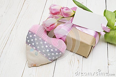 Beautiful tulips with gift box. happy mothers day, romantic still life, fresh flowers. Stock Photo