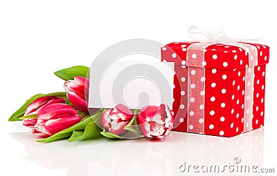 beautiful tulips with red polka-dot gift box. happy mothers day, romantic still life, fresh flowers Stock Photo