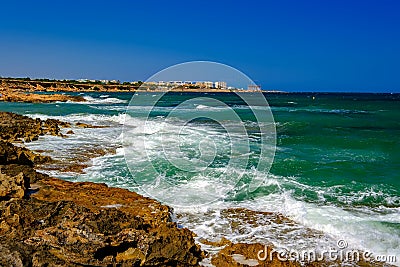 Beautiful turquoise sea and the coast of Orihuela Costa in Spain Stock Photo