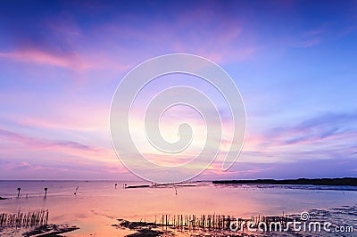 Beautiful twilight silhouette sunset at tropical sea. Stock Photo